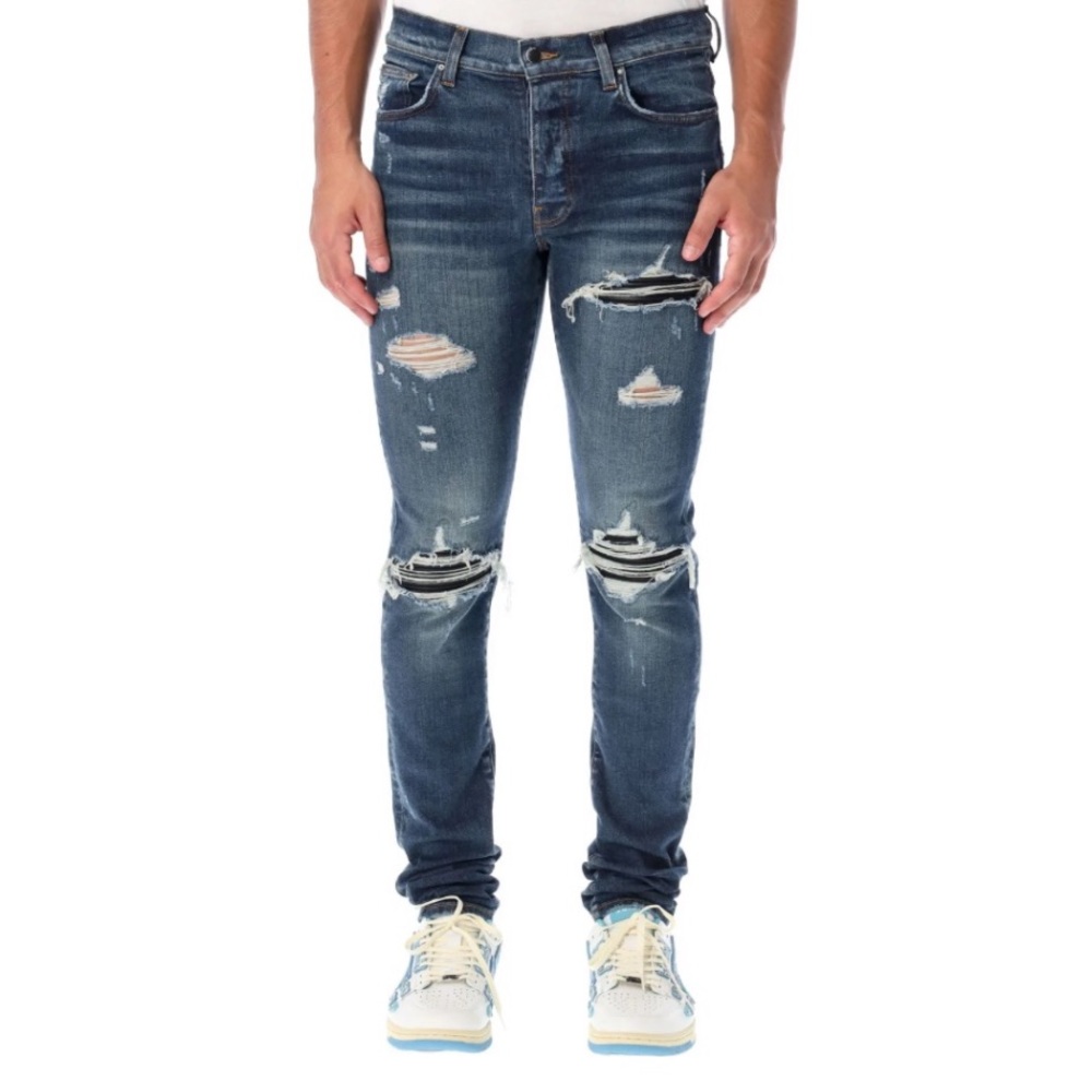 Amari Distressed Skinny Jeans